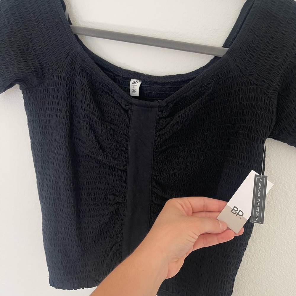 Cropped top. New with tags. Off the shoulder. So flattering.